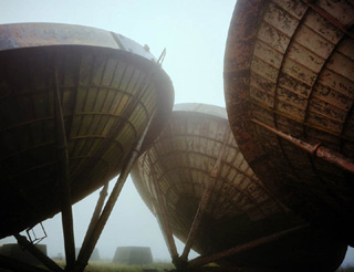 Rusty satellite dishes.