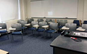 Classroom 14N-217 view of student desks and back of classroom from faculty point of view.