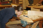 A student sites the underwater shape of her hull model.