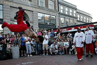 Photo of a man break dancing.