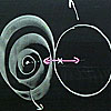 On a chalkboard, a circle is drawn on the right and next to it a spiral. A pink arrow, labeled x,  connects them.