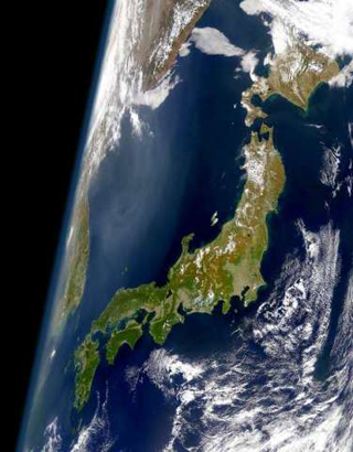 Satellite photograph focusing on Japan, with parts of East Asia also visible.