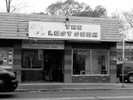 Photo of the outside of a building with the sign that reads 'The Lost Sock'.