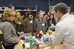 Girls are touring a 3D printing laboratory.